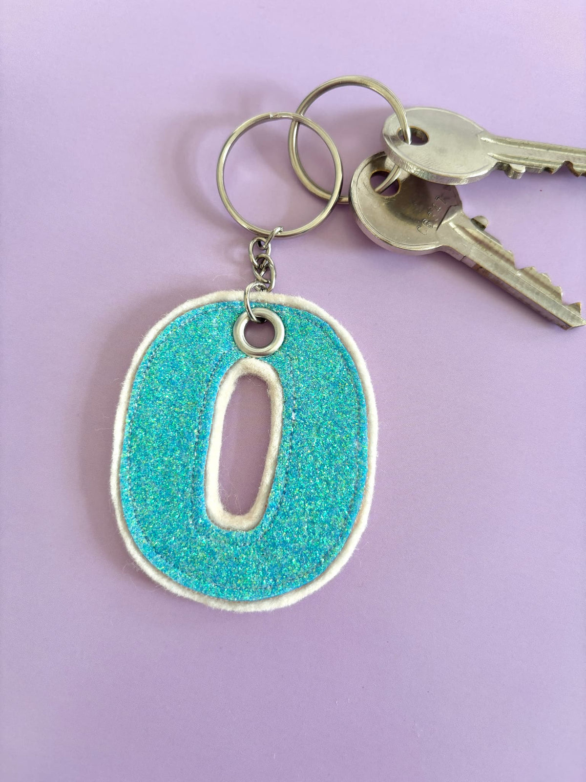 Blue O Glitter Keyring